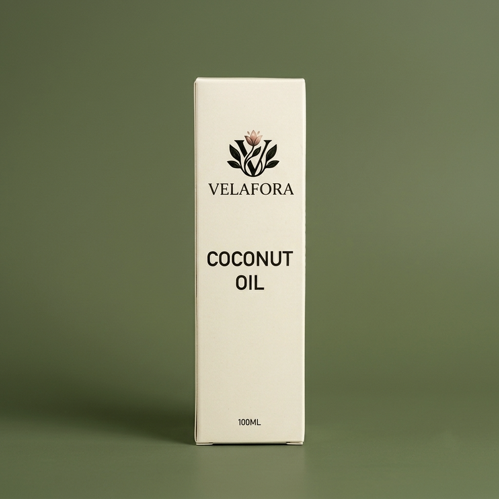 A tall, rectangular cream-colored box of Velafora Coconut Oil, standing upright against a solid sage green background.


